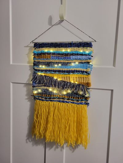 Textile turned on, with lights shining.